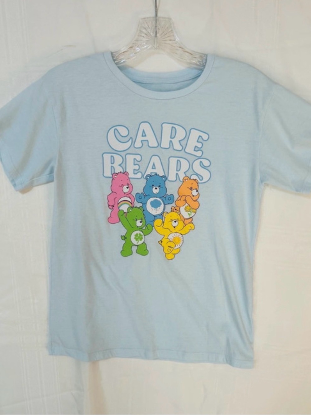 Kids Graphic Tee Size Large Care Bears in lite blue. 80s vintage.